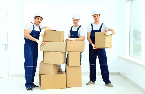 Moving van and packed boxes ready for a home move in Upper Clapton