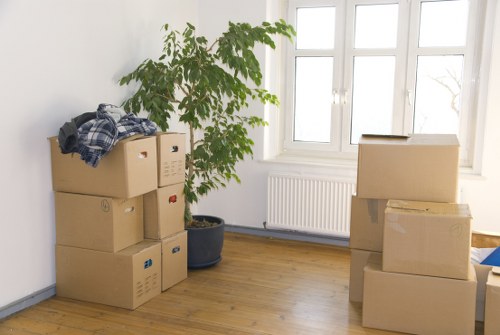 Loading household items into a removals van in Upper Clapton