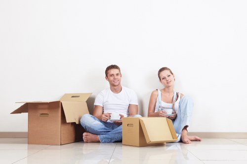 Packed boxes and furniture being prepared for a residential move