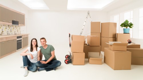 Checklist and packed belongings ready for a house move in Upper Clapton