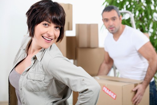 Packed boxes and household items arranged inside a removal truck