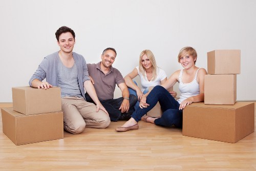 Packed boxes and furniture inside a local home removal service