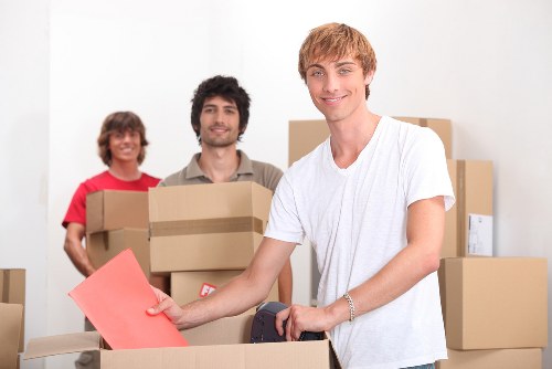 Team collecting bulky household furniture from a local property