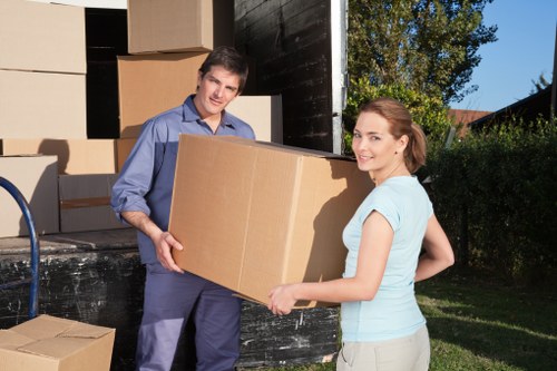 Removal team loading furniture carefully for a flat or house move